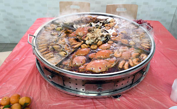 国产麻豆精品久久久机械年会海鲜锅
